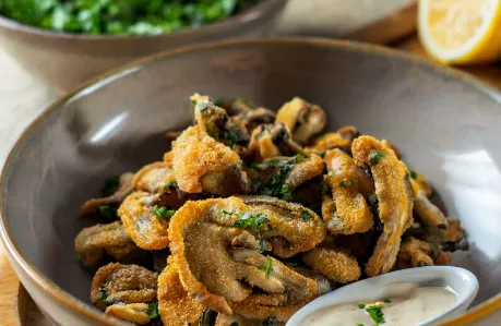 Funghi pleurotus impanati